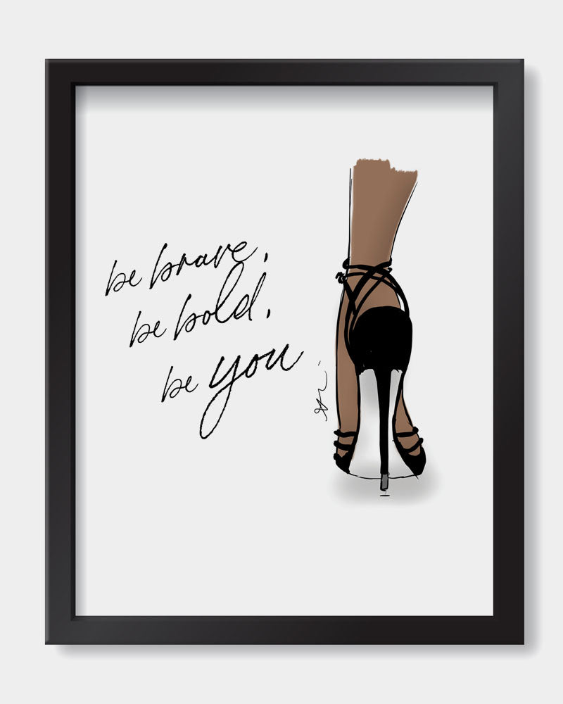 Art print with the words be brave, be bold, be you written in cursive. On the right is a woman's leg posing elegantly in a black heel